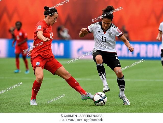 Germany's Celia Sasic (R) and Lucy Bronze from England vie for the ball during the FIFA Women's World Cup 2015 third place soccer match between England and...