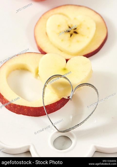 Cut out apple hearts