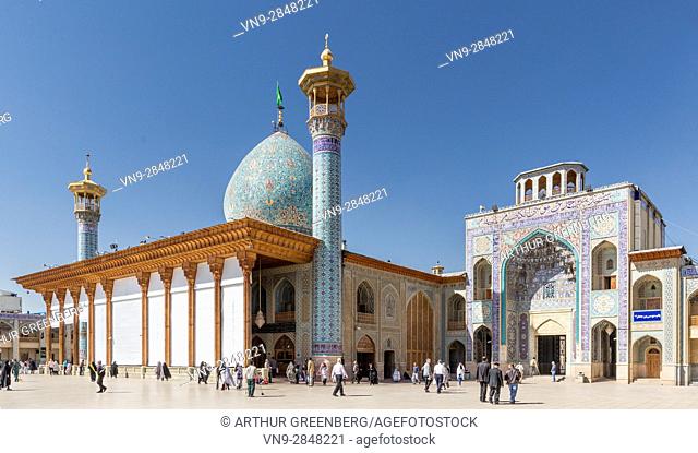 Shiraz, Iran - 23 February 2016: Crowd of visitors in forecourt of Shah Cheragh mausoleum