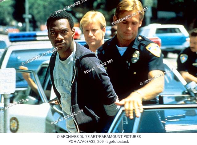 Beverly Hills Cop  Year: 1984 USA Eddie Murphy, Gerald Berns, William Wallace Director: Martin Brest. It is forbidden to reproduce the photograph out of context...