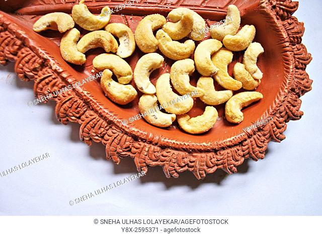 Dried fruits , Cashew nuts in earthenpot, Poona, mahrshtra, India