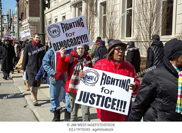 Detroit, Michigan - Detroit residents picket the Detroit Athletic Club, where Governor Rick Snyder was speaking, to protest Snyder's plan to appoint an...