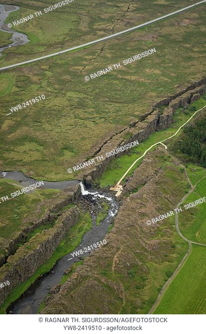 Mid-Atlantic Ridge, Almannagja Fissure, Thingvellir National Park, Iceland. The cracks and faults of the Alamannagja fissure is where the Eurasian and North...