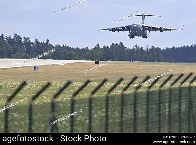 Boeing C-17 Globemaster aircraft of US Army land and bring helicopters Bell AH-1Z Viper for Czech pilots in Namest nad Oslavou, Czech Republic, July 26, 2023