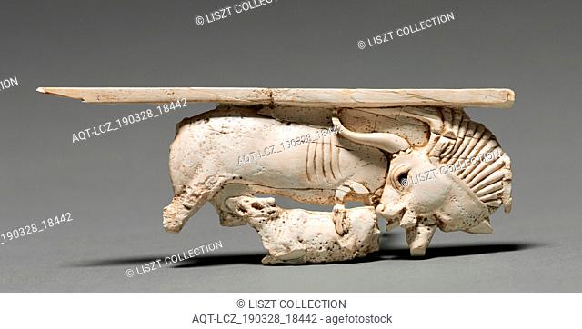 Decorative Plaque: Cow Nursing Its Calf, 900-800 BC. Phoenician, Iraq, Nimrud, 9th-8th Century BC. Ivory; overall: 4.6 x 12.4 cm (1 13/16 x 4 7/8 in.)