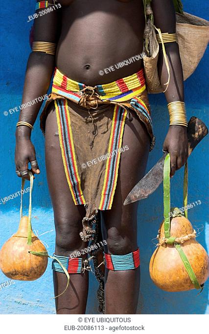Tsemay woman traditionally dressed at weekly market