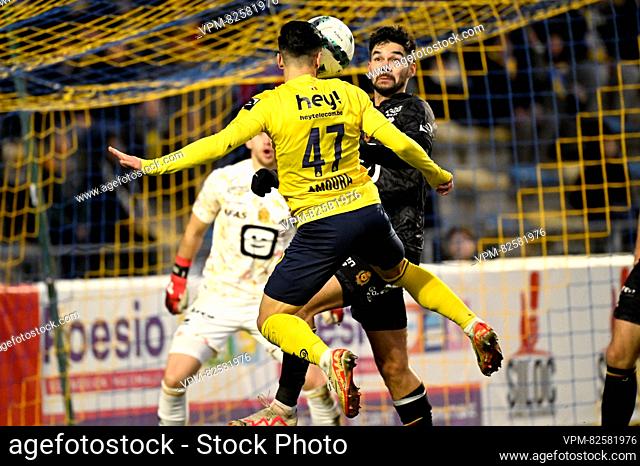 Union's Mohamed Amoura and Mechelen's Sandy Walsh pictured in action during a soccer match between Royale Union Saint-Gilloise and KV Mechelen