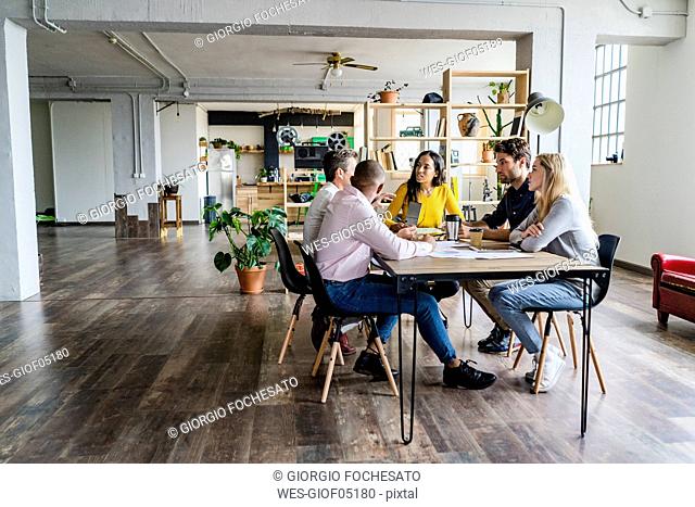 Business team having a meeting in loft office