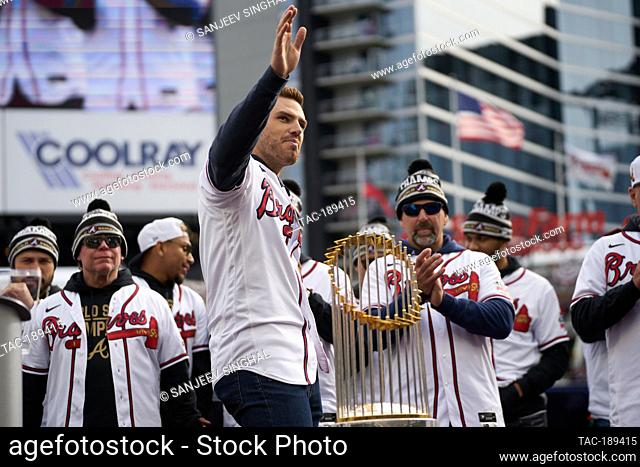 First Baseman Freddie Freeman waives at fans at a ceremony after a parade to celebrate the World Series Championship for the Atlanta Braves at Truist Park in...