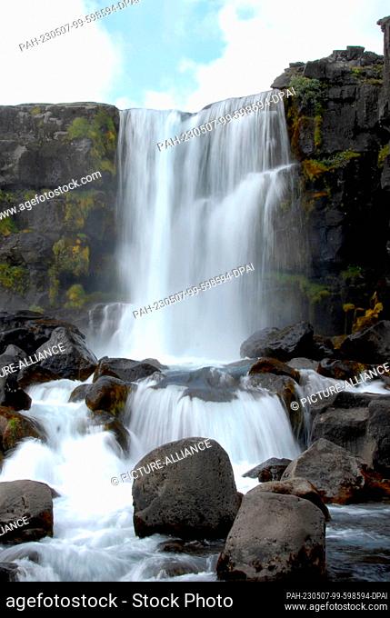 02 August 2022, Iceland, Thingvellir: Öxarárfoss is a waterfall in the west of Iceland in Thingvellir National Park on the Golden Circle