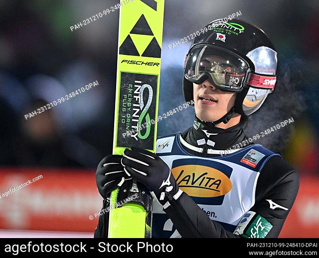 10 December 2023, Saxony, Klingenthal: Nordic skiing/ski jumping, World Cup, large hill, men, 2nd round. Ren Nikaido from Japan reacts after his jump