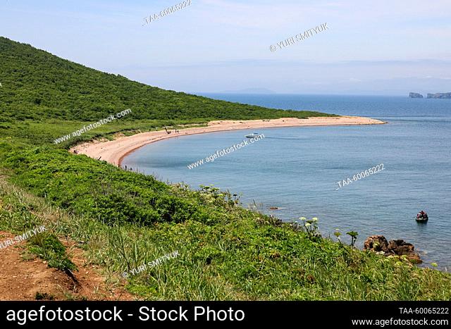 RUSSIA, VLADIVOSTOK - JUNE 24, 2023: The shoreline of Zheltukhin Island in the Sea of Japan in summer. Yuri Smityuk/TASS