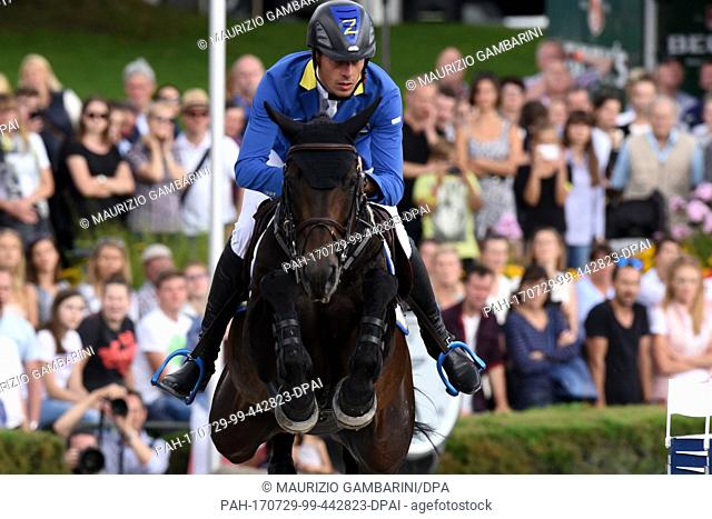 German show jumper Christian Ahlmann rides Codex One during the Grand Prix of Berlin 1.60m Against the Clock with Jump-Off event at the Global Champions Tour in...