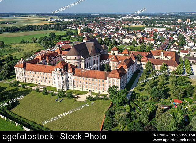 23 June 2020, Baden-Wuerttemberg, Ulm-Wiblingen: The morning sun hits the Wiblingen Monastery. The former Benedictine abbey was founded in 1093 and existed...