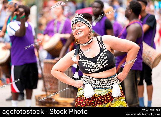 Cleveland, Ohio, USA - June 9, 2018 women perform an african dance At the abstract art festival Parade The Circle
