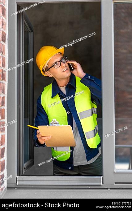 builder with clipboard and calling on smartphone