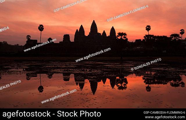 Siem Reap, Cambodia - January 19, 2011: Sunrise at the archeological wonder Angkor Wat complex