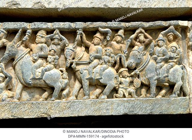Wall carry male and female figures riding animals at Halebidu ; district Hassan ; Karnataka ; India