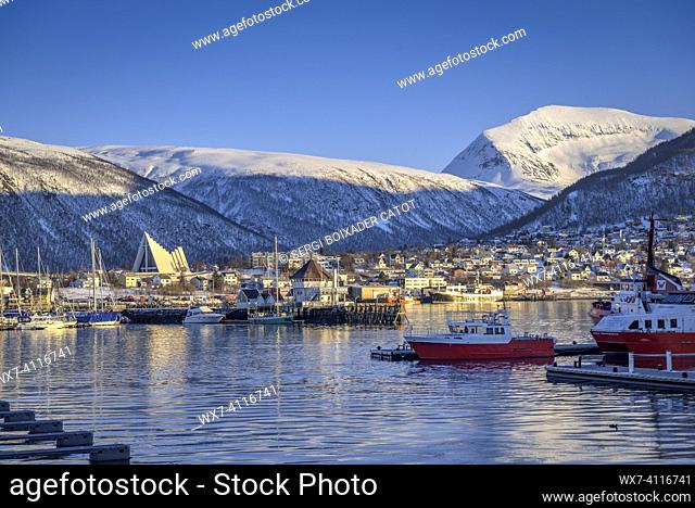 Tromsø Harbor, and the Arctic Cathedral on a sunny winter afternoon (Tromsø, Norway)
