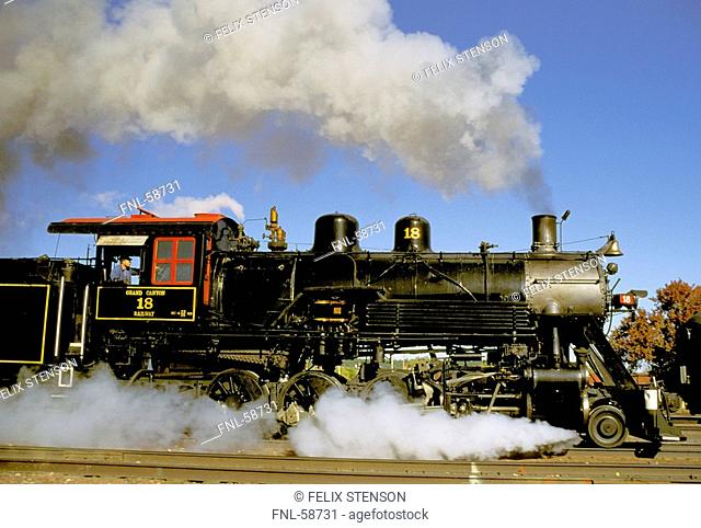 Smoke emitting from steam locomotive engine