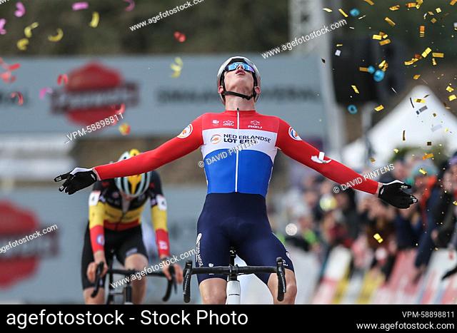 Dutch Tibor Del Grosso celebrates as he crosses the finish line to win the men's Under 23 race at the Cyclocross World Cup cyclocross event in Besancon, France