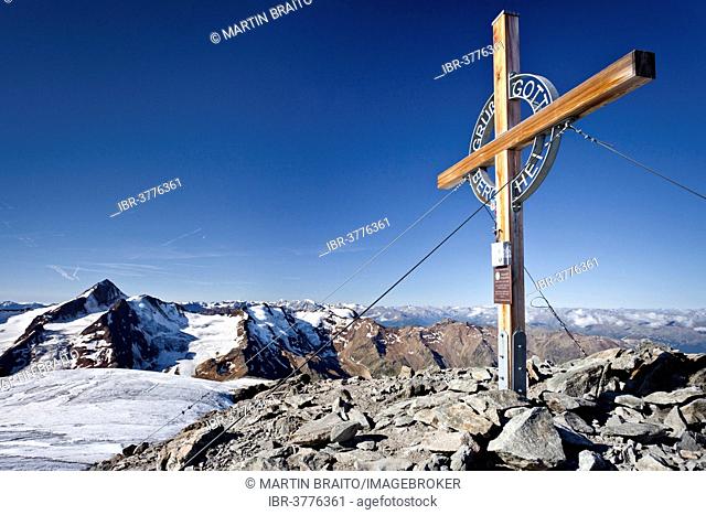Summit cross on Weißseespitze Mountain, looking towards Weißkugel Mountain, Langtaufers, Alta Val Venosta or Upper Vinschgau Valley, Alto Adige, Italy
