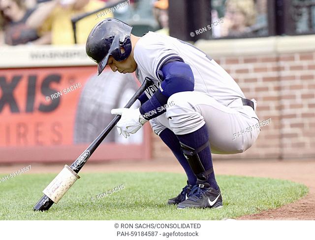 New York Yankees designated hitter Alex Rodriguez (13) waits to bat in the first inning against the Baltimore Orioles at Oriole Park at Camden Yards in...