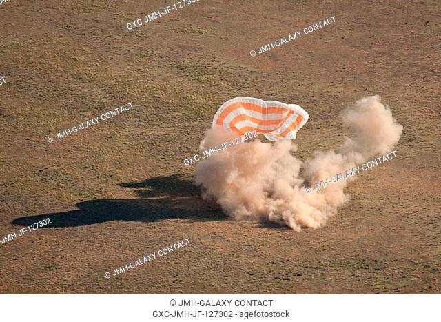 The Soyuz TMA-20 spacecraft is seen as it touches down with Russian cosmonaut Dmitry Kondratyev, Expedition 27 commander