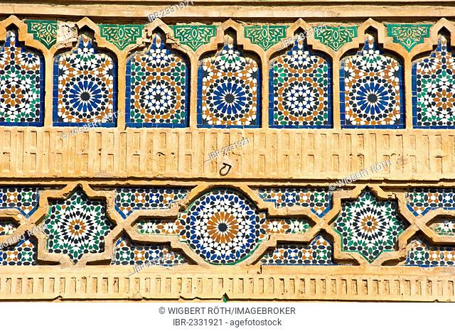 Tile mosaics, zellige, zillij or zellij tilework, on a gate to the royal palace, Dar el-Makhzen, Meknes, Morocco, Africa