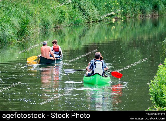 Canoeing on the Kennet and Avon Canal near Aldermaston Berkshire on July 5, 2015. Unidentified people