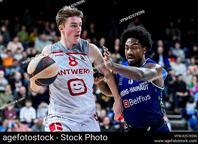 Antwerp's Jo Van Buggenhout and Mons' Christopher Barton pictured in action during a basketball match between Antwerp Giants and Mons Hainaut