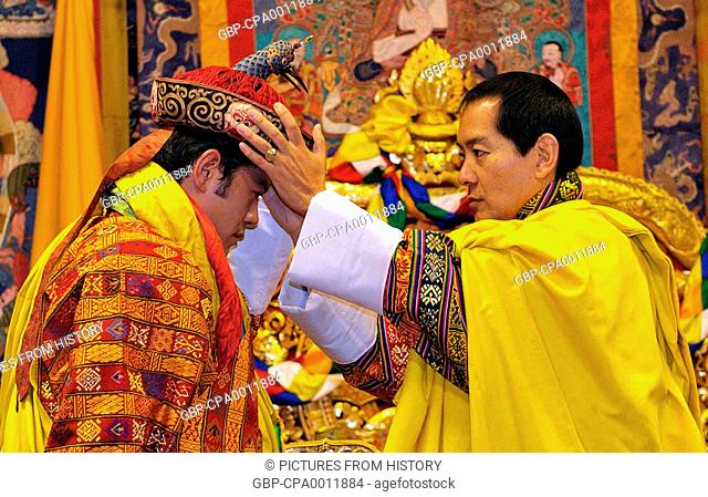 Bhutan: His Majesty Ugyen Wangchuck, 4th Druk Gyalpo or 'Dragon King' (r. 1972-2006) crowning his son Jigme Khesar Namgyel Wangchuk 5th Druk Gyalpo in 2008