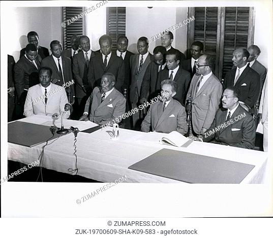 June 9, 1970 - Emperor Haile Selassie of Ethiopia on state visit in Kenya: The Emperor with President Kenyatta of Kenya signing a border treaty at the State...