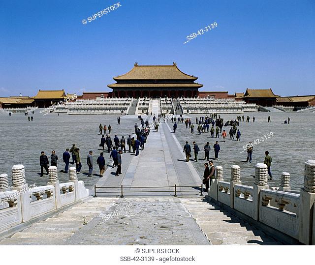 Tourists in a pavilion, Hall of Supreme Harmony, Forbidden City, Beijing, China