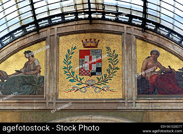 Milan, Italy - July 09, 2013: Golden Fresco at Oldest Shopping Mall Arcade Galleria Vittorio Emanuele II in Milan, Italy