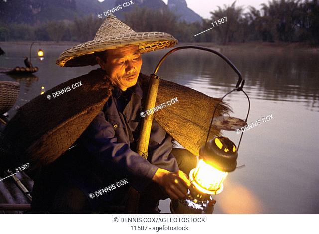 Cormorant fisherman on the Li River. Chuang Autonomous Region of Kwangsi (Guangxi). China