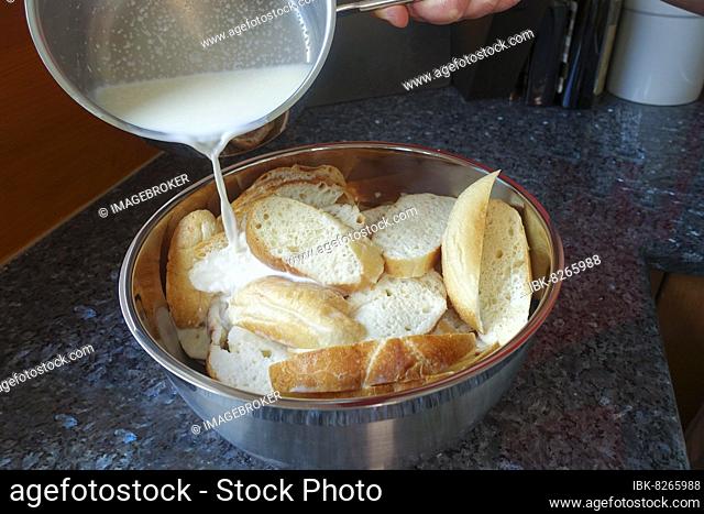 Swabian cuisine, pouring hot milk over sliced bread rolls, preparing simple cherry pudding, poor people's food, using leftovers, dessert from the oven