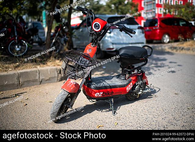 22 October 2020, Pakistan, Islamabad: An ""ezbike"" electric scooter from the Bike Sharing Service is standing on a street