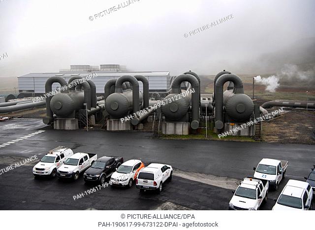 13 June 2019, Iceland, Reykjavik: Numerous pipes on the site of the Hellisheidi geothermal power plant south of Reykjavik