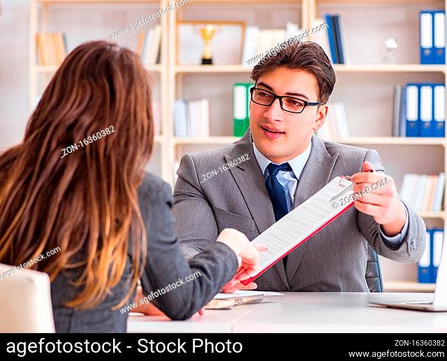 The business meeting between businessman and businesswoman