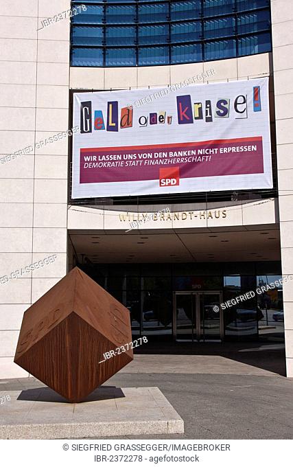 Entrance area of the Willy-Brandt-House with a banner Geld oder Krise, German for money or crisis, Berlin, Germany, Europe