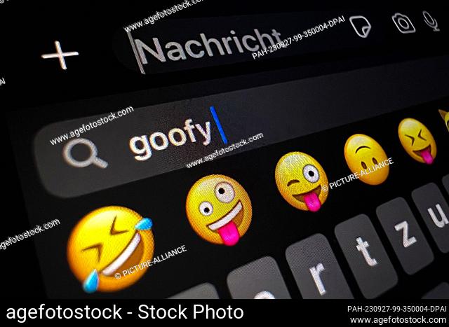 ILLUSTRATION - 25 September 2023, Berlin: On the display of a smartphone, the word ""goofy"" can be read in the search field for smileys