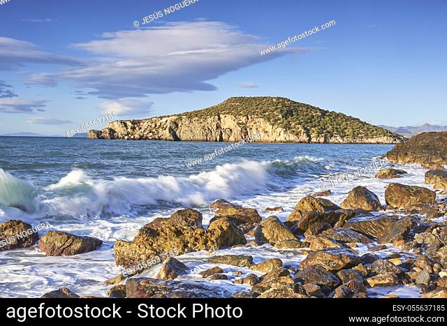 Rocky beach and waves in the Mediterranean Sea of Mazarron in the Murcia region. Spain