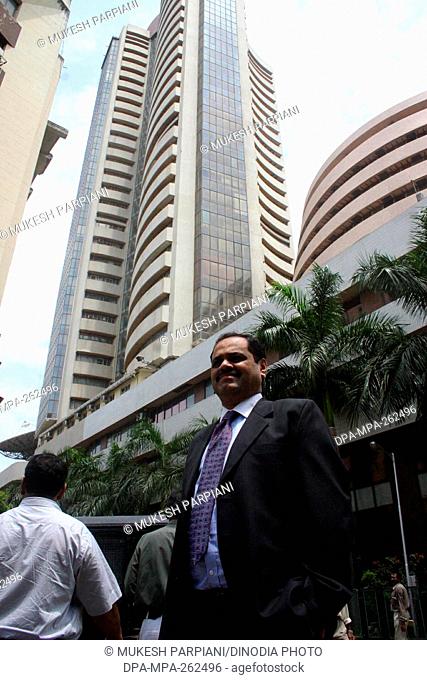 Ramesh Damani standing below Bombay Stock Exchange, Mumbai, Maharashtra, India, Asia