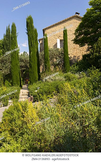 View of La Bastide de Moustiers, a house converted to a hotel, in Moustiers-Sainte-Marie, a medieval village in Alpes-de-Haute-Provence region in southern...