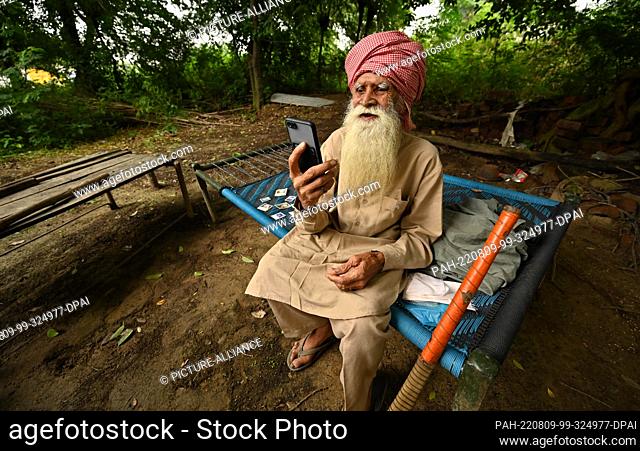05 August 2022, India, Powt: Pritam Khan in front of his house in the village of Powt in the Indian state of Punjab. Pritam was about nine years old when the...