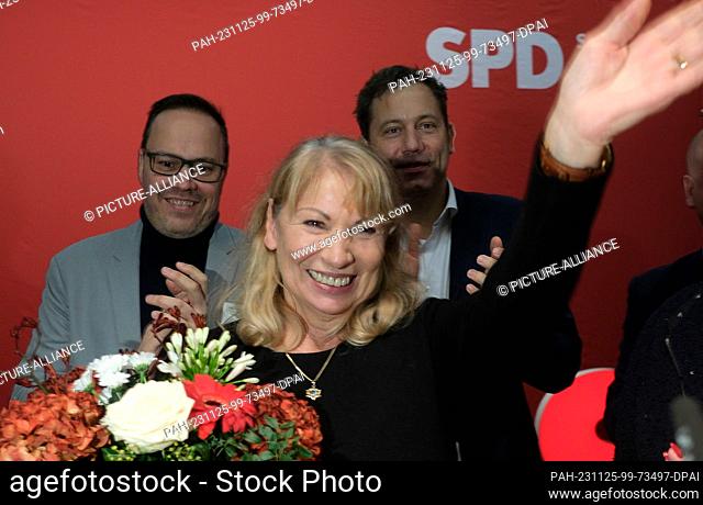 25 November 2023, Saxony, Neukieritzsch: Petra Köpping (SPD), Saxony's Minister of Social Affairs, cheers at the extraordinary state party conference of...
