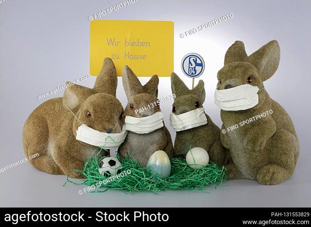 firo: 06.04.2020 Easter 2020, Easter bunnies with face mask and Schalke logo Fuvuball is canceled and all fans have to stay at home Easter bunny family with...