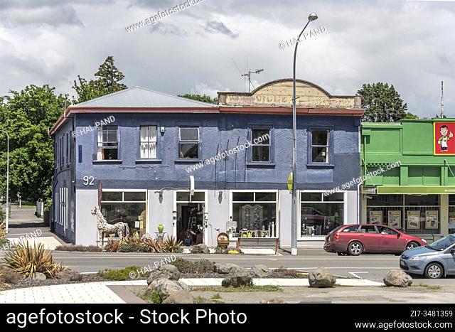 WOODVILLE, NEW ZEALAND - November 12 2019: cityscape with old commercial building on main street of little village, shot in bright spring light on november 12...