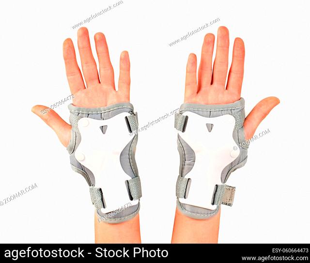 Roller skater wearing wards guards protector pads, wrist protection on hands woman isolated white background